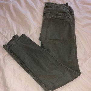 Dark green skinny jeans patchy kinda